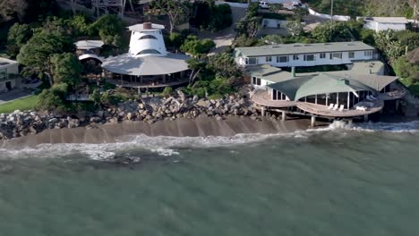Multi-million-dollar-mansions-along-coastline-in-Malibu,-California---aerial