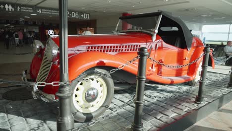 Captured-at-Václav-Havel-Airport-in-Prague,-this-image-showcases-a-vintage-car-from-the-1940s