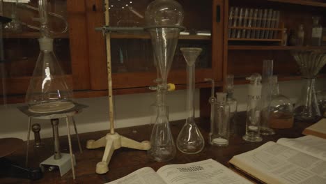 Exhibition-of-scientific-glassware-and-other-glass-vessels-at-the-National-Technical-Museum-in-Prague-showcases-a-collection-of-flasks-and-containers-used-for-scientific-experiments,-Czech-Republic