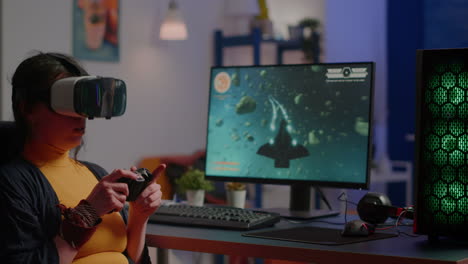 Player-woman-wining-space-shooter-game-using-virtual-reality-goggles