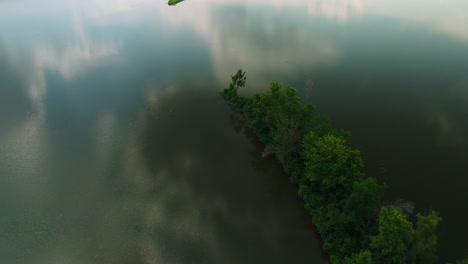 Calm-Lake-With-Sky-Reflection-In-Cook's-Landing-Park-Near-Little-Rock,-Arkansas,-USA---aerial-top-down
