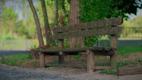 wooden-park-bench-in-a-public-park-slow-motion-full-shot