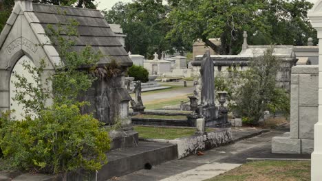 Aerial-view-of-crips-and-statue-at-the-old-Metairie-cemetery
