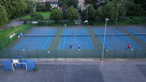 Tennis-Players-on-Outdoor-City-Park-Courts-in-Bruce-Castle,-London
