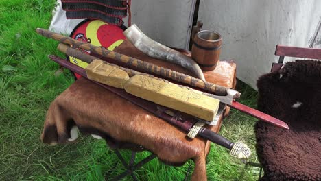 Viking-re-enactment-table-of-fighting-equipment-used-in-ancient-times-at-Waterford-Ireland-Viking-City