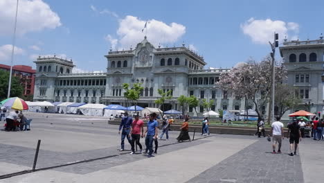People-enjoy-sunny-city-day-in-Constitution-Plaza-in-Guatemala-City