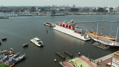 Ferry-Boat-Arriving-At-The-NDSM-Ferry-Terminal-In-Amsterdam,-Netherlands