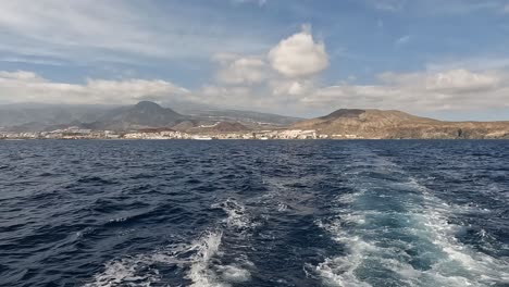 Whale-watching-boat-travelling-away-from-the-harbour-in-Tenerife