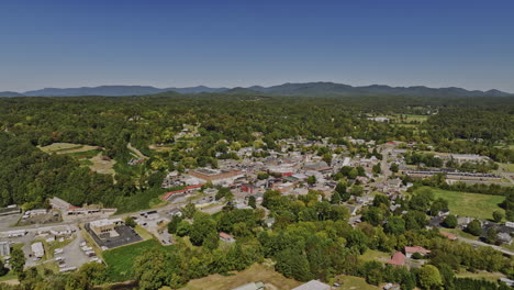 Ellijay-Georgia-Aerial-v2-cinematic-drone-flyover-river-town-capturing-quaint-community-surrounded-by-mountainous-landscape-at-daytime-during-summer-season---Shot-with-Mavic-3-Cine---October-2022