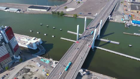 Aerial-over-the-newly-built-Hisingsbron-Bridge-over-Gota-Alv-River-In-Gothenburg-City,-Sweden