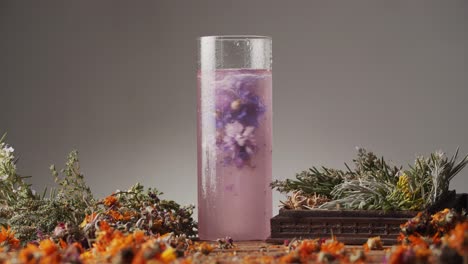 Fresh-flower-drink-on-a-table-covered-in-spring-flowers