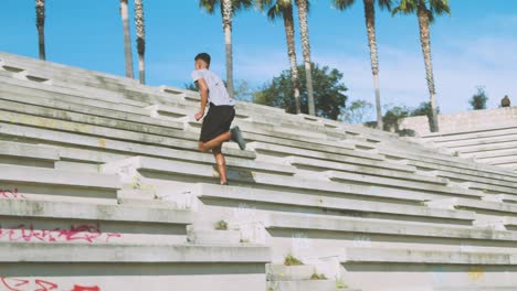 Black-athlete-running-up-steps
