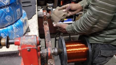 Copper-wire-reels-in-cable-factory-close-up