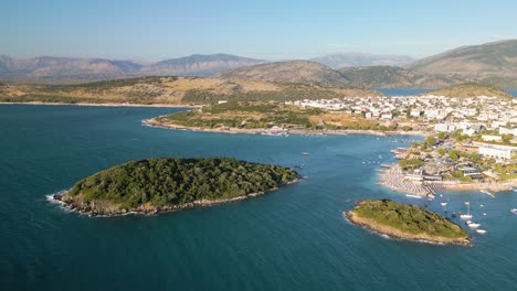 Aerial-drone-panning-shot-of-the-south-coast-at-Albania-on-a-sunny-day