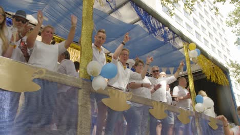 Truck-from-Mister-Gay-Belgium-during-the-Antwerp-Pride-Parade-2023-in-Belgium-with-blue-and-white-balloons