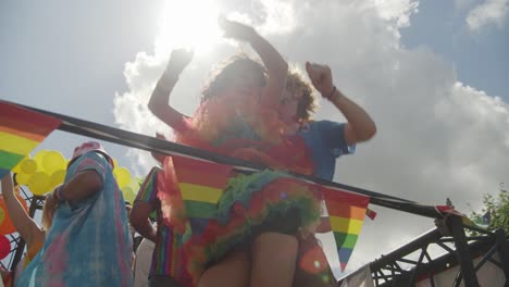 People-dancing-in-the-sunlight-during-the-Antwerp-Pride-Parade-2023-in-Belgium