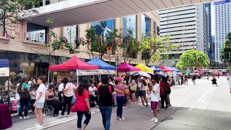 Filipino-and-Indonesian-Helpers'-Sunday-Market-in-Central-District,-Hong-Kong