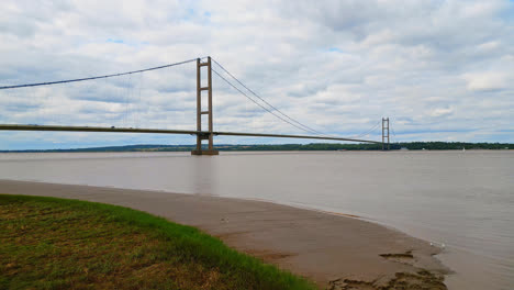 Aerial-view-of-Humber-Bridge,-12th-largest-single-span-worldwide,-connecting-Lincolnshire-to-Humberside-over-River-Humber