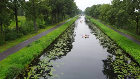 Aerial-view-of-kayakkers-peddling-through-the-Beverlo-canal