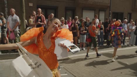 Woman-and-man-dancing-during-the-Antwerp-Pride-Parade-2023-in-Belgium