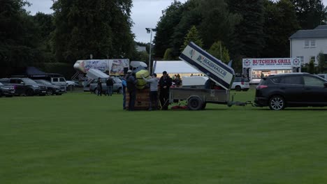 Static-shot-of-a-crew-setting-up-a-hot-air-balloon-at-the-Strathaven-Balloon-Festival