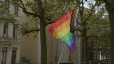 Rainbow-colored-flag-moving-from-left-to-right-during-the-Antwerp-Pride-Parade-2023-in-Belgium