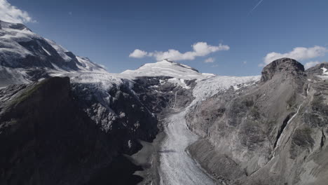 Pasterze-glacier-with-Grossglockner-massif-and-Johannisberg-peak,-Austria,-Drone-shot,-Slow-motion