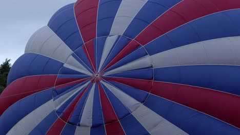 Close-up-shot-of-the-top-of-a-hot-air-balloon-setting-up-at-Strathaven-Balloon-festival