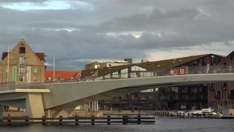 Pedestrian-bridge-on-a-canal-in-Copenhagen,-Denmark