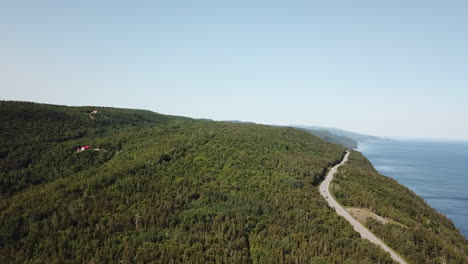 Aerial-view-of-mountain-by-the-side-of-St-Laurence-Golf-in-Gaspesie-Quebec-Canada