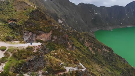 Aerial-Orbital-Shot-Overlooking-the-Scenic-Viewpoint-of-Quilotoa-Lake-in-Ecuador