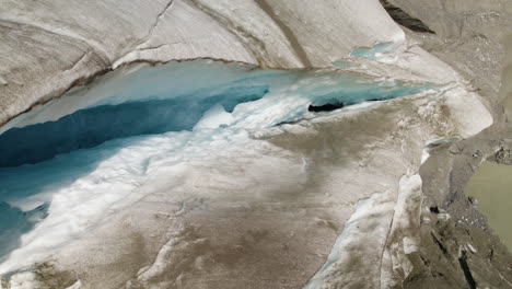 Pasterze-glacier-melting-ice-cave-due-to-global-warming,-Retreating-glacier-of-Austrian-Alps,-Closeup