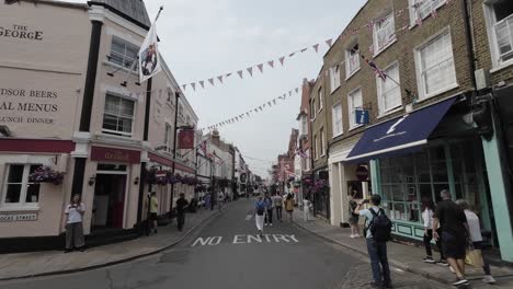 A-shot-of-tourists-visiting-the-city-of-Windsor-during-the-day,-England