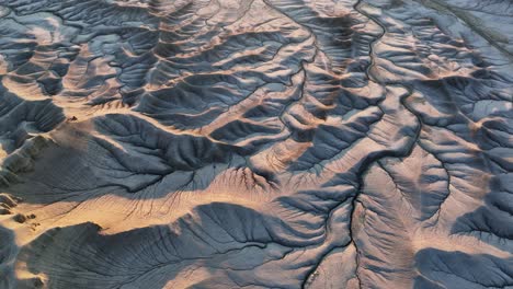 Cinematic-aerial-forward-over-huge-desert-mountain-panorama-in-Utah,-sunset