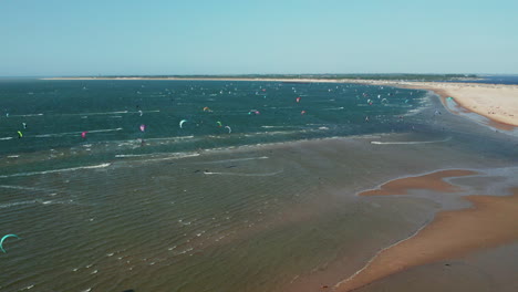 Aerial-View-Of-Kitesurfing-Spot-In-Brouwersdam,-Netherlands---drone-shot