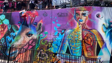Famous-urban-vindicative-graffit-art-in-comuna-13-of-Medellin,-Colombia