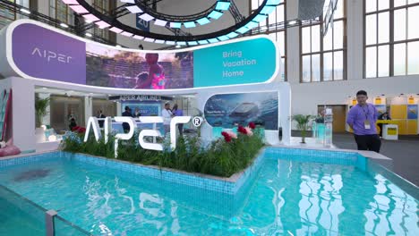 Swimming-pool-at-IFA-Berlin-2023-with-a-super-new-swimming-cleaner-robot