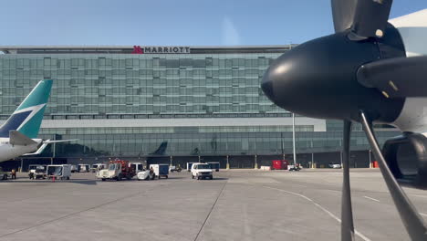 Airplane-Driving-Past-Marriott-Hotel-on-Airport-Runway-at-Calgary-YYC-Airport-on-7-18-2023