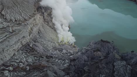 Steaming-sulphur-gas-flames-in-crater-of-volcano-Kawah-Ijen-in-Indonesia