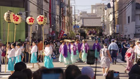 Japanese-Lanterns-Carried-Through-Street-at-Tenjin-Festival