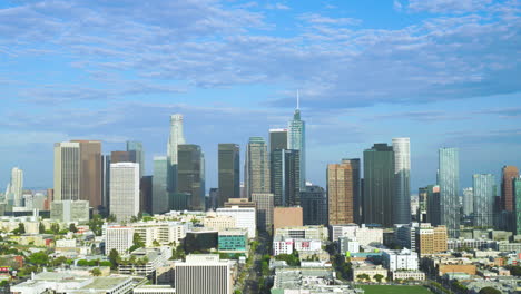Aerial-establishing-shot-of-downtown-Los-Angeles-with-multiple-skyscrapers