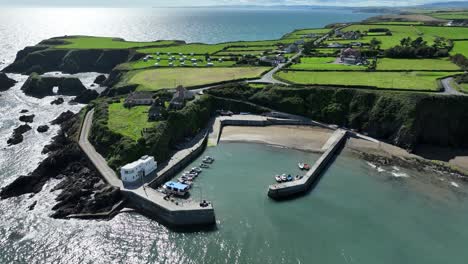 Drone-establishing-shot-of-Boatstrand-a-small-fishing-harbour-on-the-Waterford-Coast-Ireland