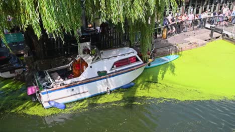 Boat-parked-on-the-Regents-Canal,-Camden,-London,-United-Kingdom