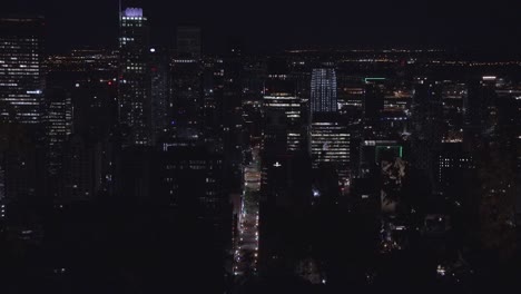 Downtown-Montreal-at-Night-from-the-Top-of-Mont-Royal,-With-Beautiful-City-Night-Lights-and-Streets