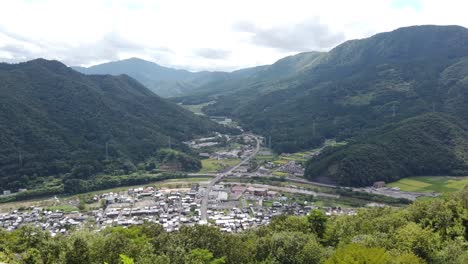 Pan-across-asago-valley-and-city-on-overcast-day,-rich-japanese-history