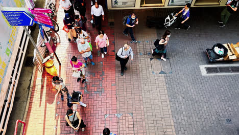 Overhead-Shot-of-Queue-for-Bus-on-Hong-Kong-Street