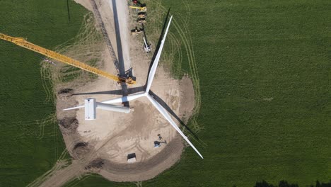 Construction-of-modern-wind-turbine,-aerial-top-down-view