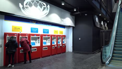 New-self-service-machines-in-the-Santiago-Metro-with-people-using-them-in-Santiago-Chile