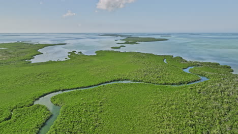 Key-West-Florida-Aerial-v33-cinematic-drone-flyover-Fivemile-Creek-leading-to-the-sea-capturing-beautiful-landscape-of-mangroves-line-up-the-coastal-shoreline---Shot-with-Mavic-3-Cine---February-2023