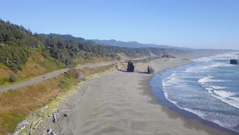 4k-Pickup-truck-driving-Oregon-Coast-Highway-101,-Viewpoint-rock-formations